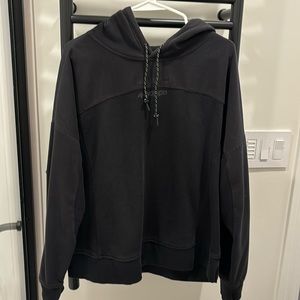 Black hoodie. The polar top. Oversize, unisex